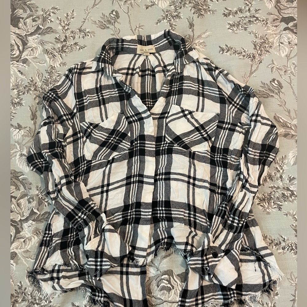 Cloth and stone flannel with slits in the back that could be tied